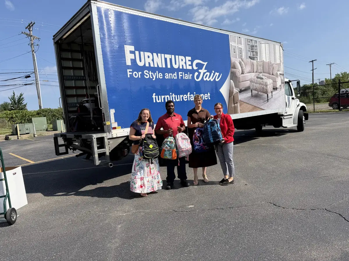 Furniture Fair delivery truck loaded with backpack donations for Operation Backpack 2026