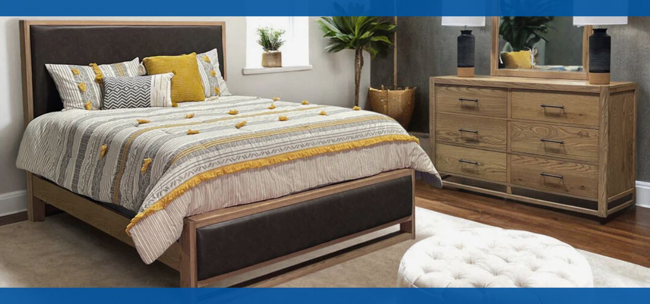 Bedroom scene with a bed, dresser, and decorative elements.