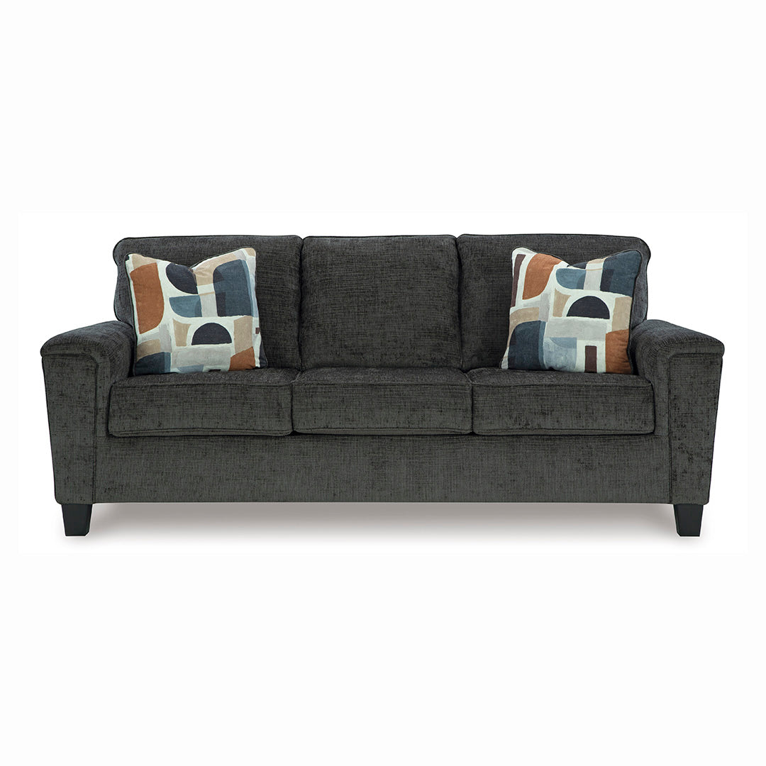 Front view of Erinslane sofa by Ashley Furniture with accent pillows