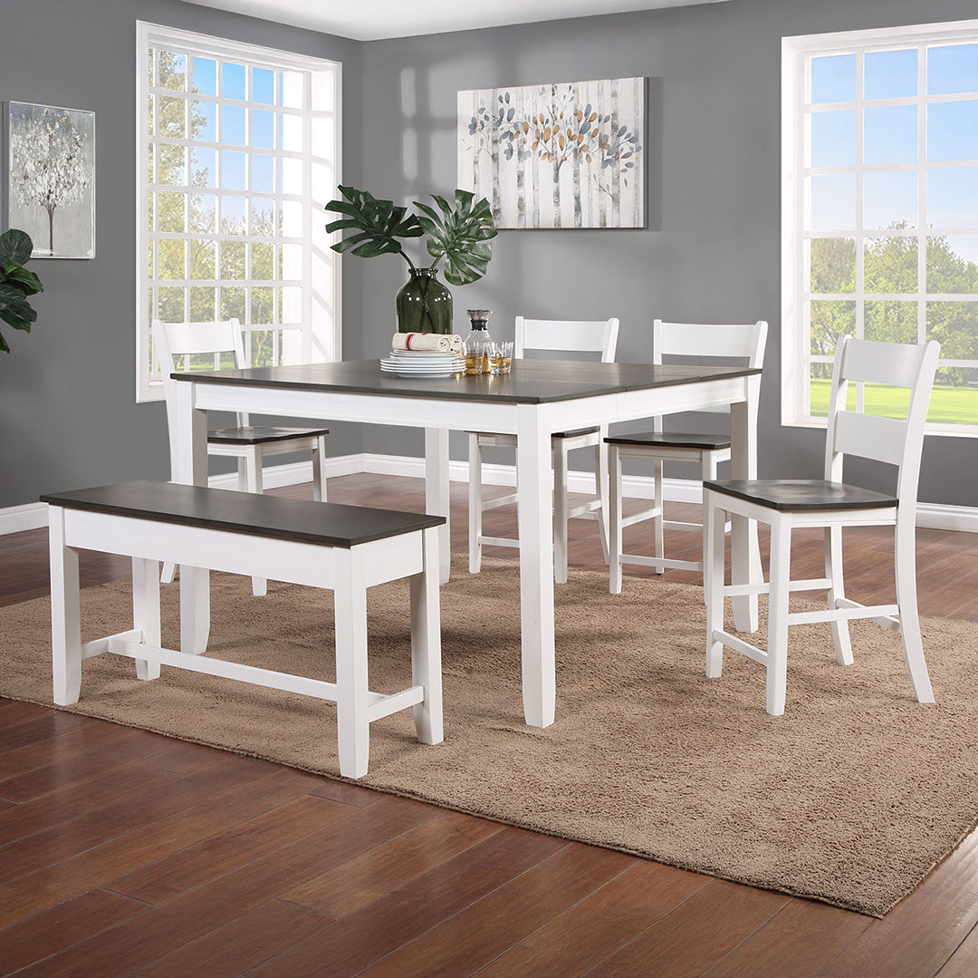 Drake counter height dining set with two-tone table, ladder-back chairs, and bench styled in a dining room