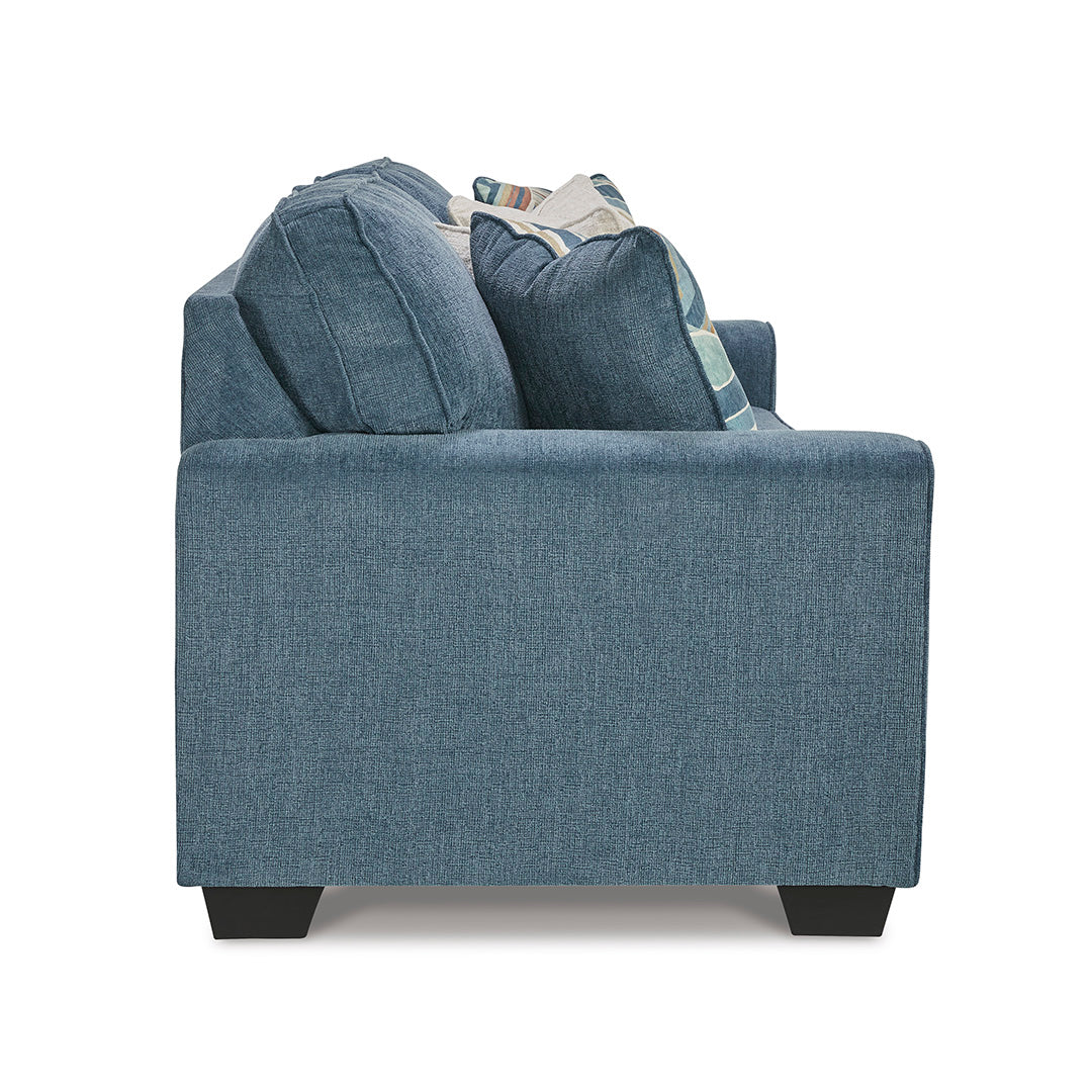 Blue sofa with a white background