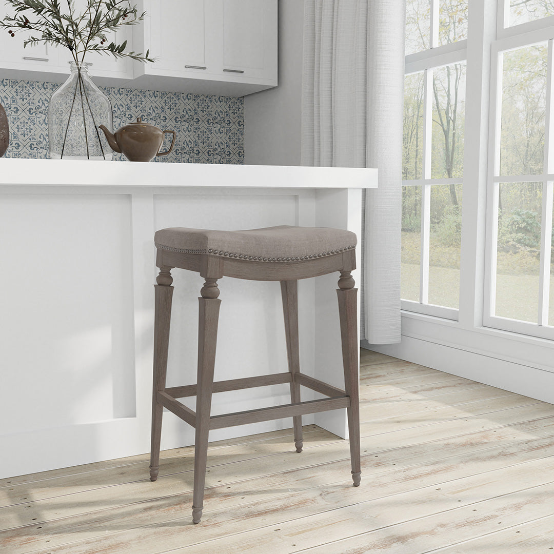 Bar stool in a kitchen setting with a window in the background