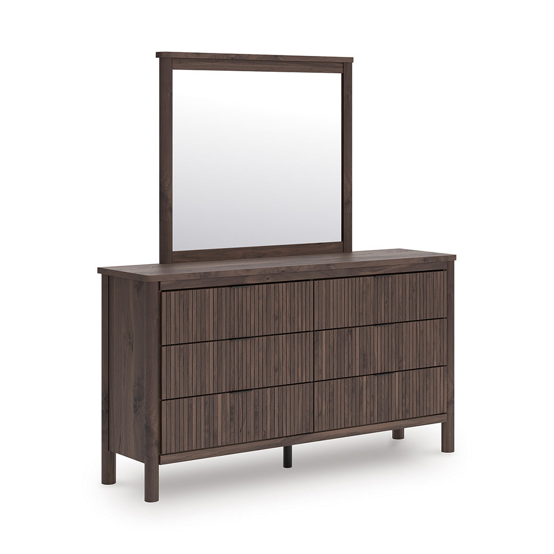 Wooden dresser with mirror on a white background