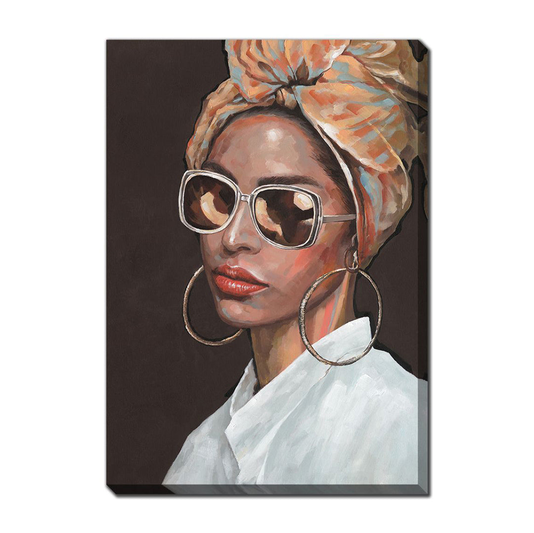 Canvas print of a woman wearing sunglasses and a headscarf on a dark background