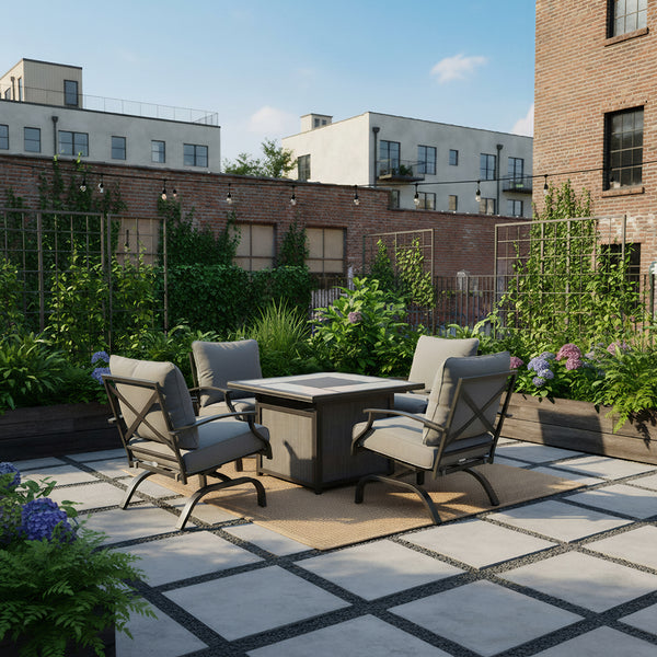 Outdoor patio set with chairs and table on a rooftop garden with buildings in the background