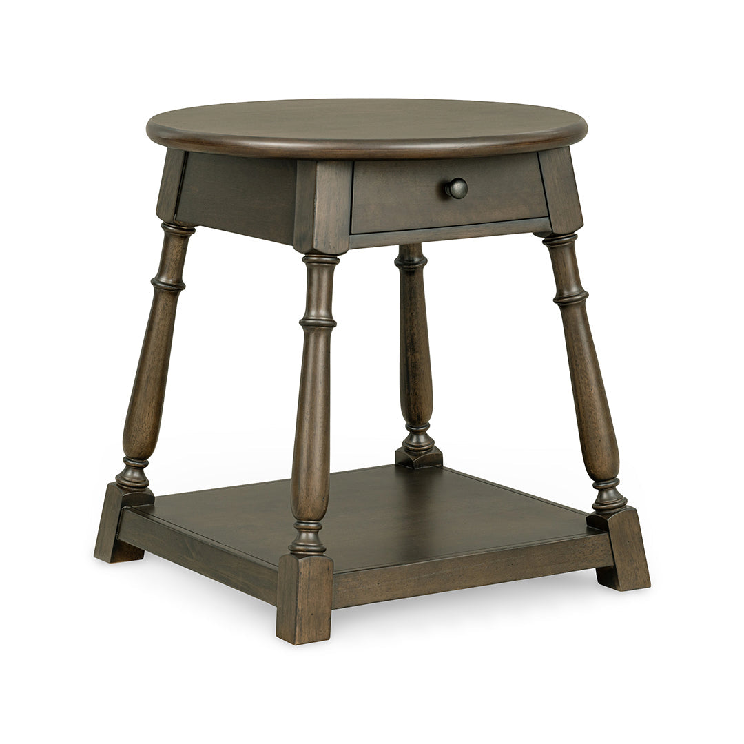 A dark brown wooden end table with a single drawer, turned legs, and a lower shelf