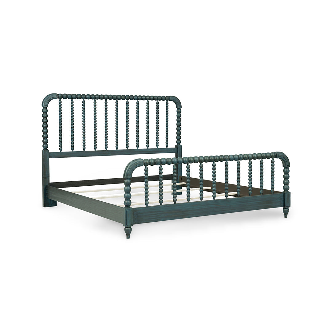 A dark teal painted wooden bed frame with spindle-style headboard and footboard rails.