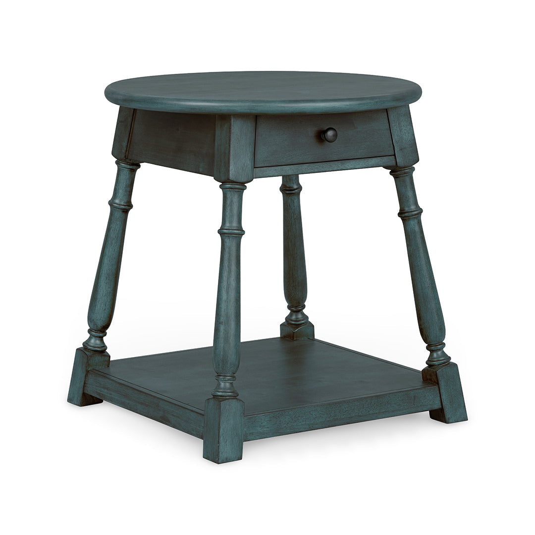 A distressed dark teal-green wooden end table with a single drawer, turned legs, and a lower shelf