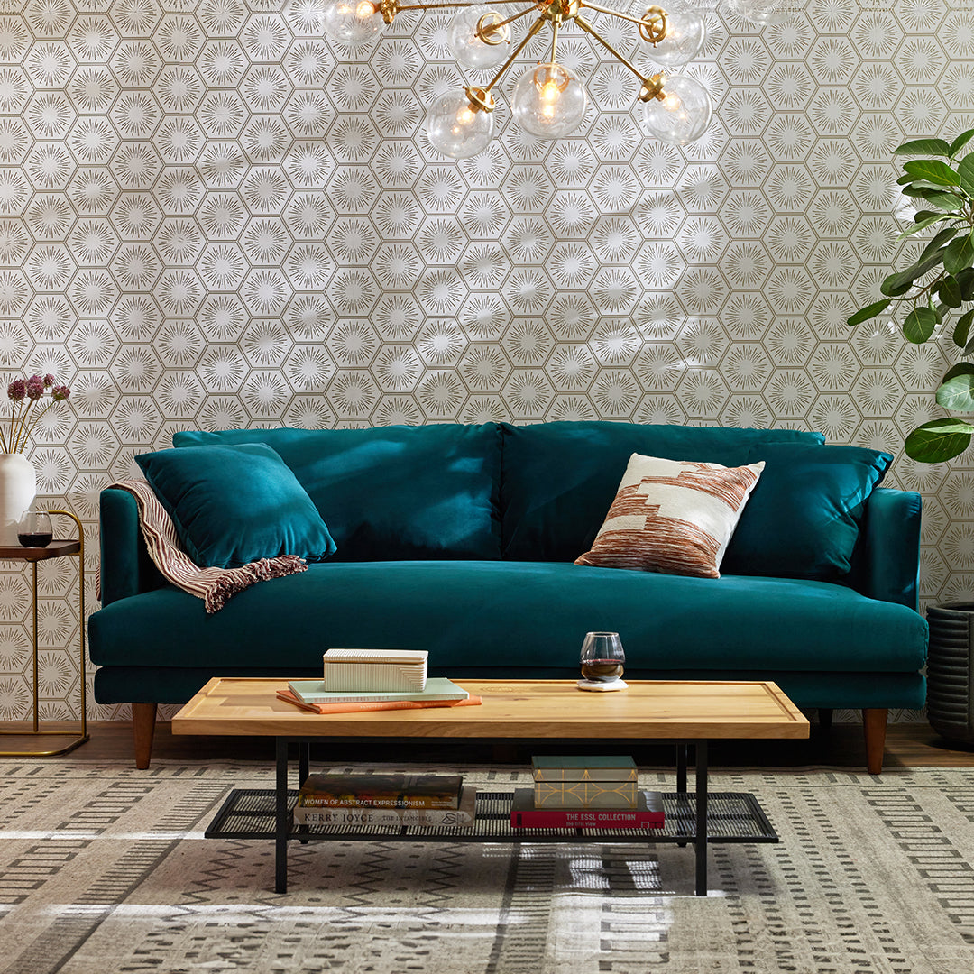 Joybird teal sofa with wooden legs