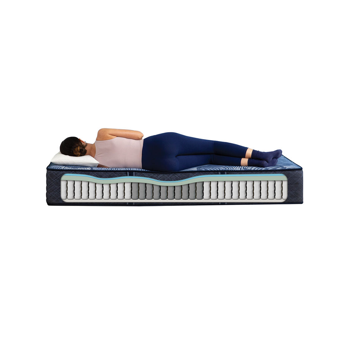 Delani Dreams Medium Perfect Sleeper mattress by Serta shown in cutaway with side sleeper