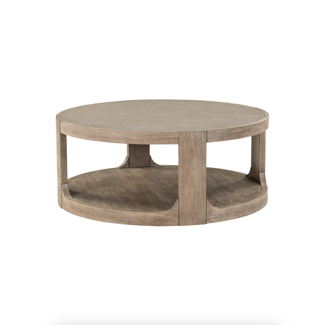 South Bend Round Cocktail Table from Liberty Furniture in Brown with Casters