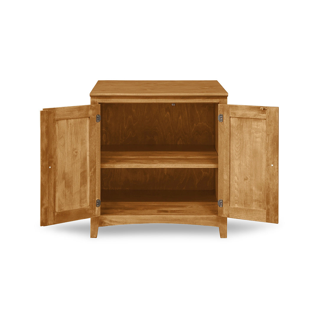 Wooden cabinet with open doors on a white background