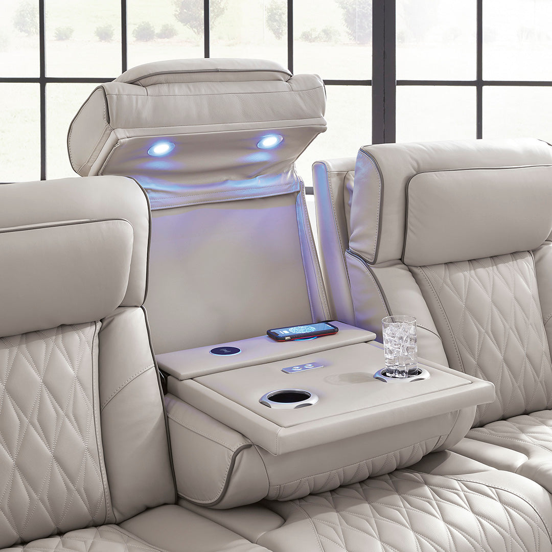 Boyington power reclining sofa by Ashley Furniture with center console, cup holders, and reading lights