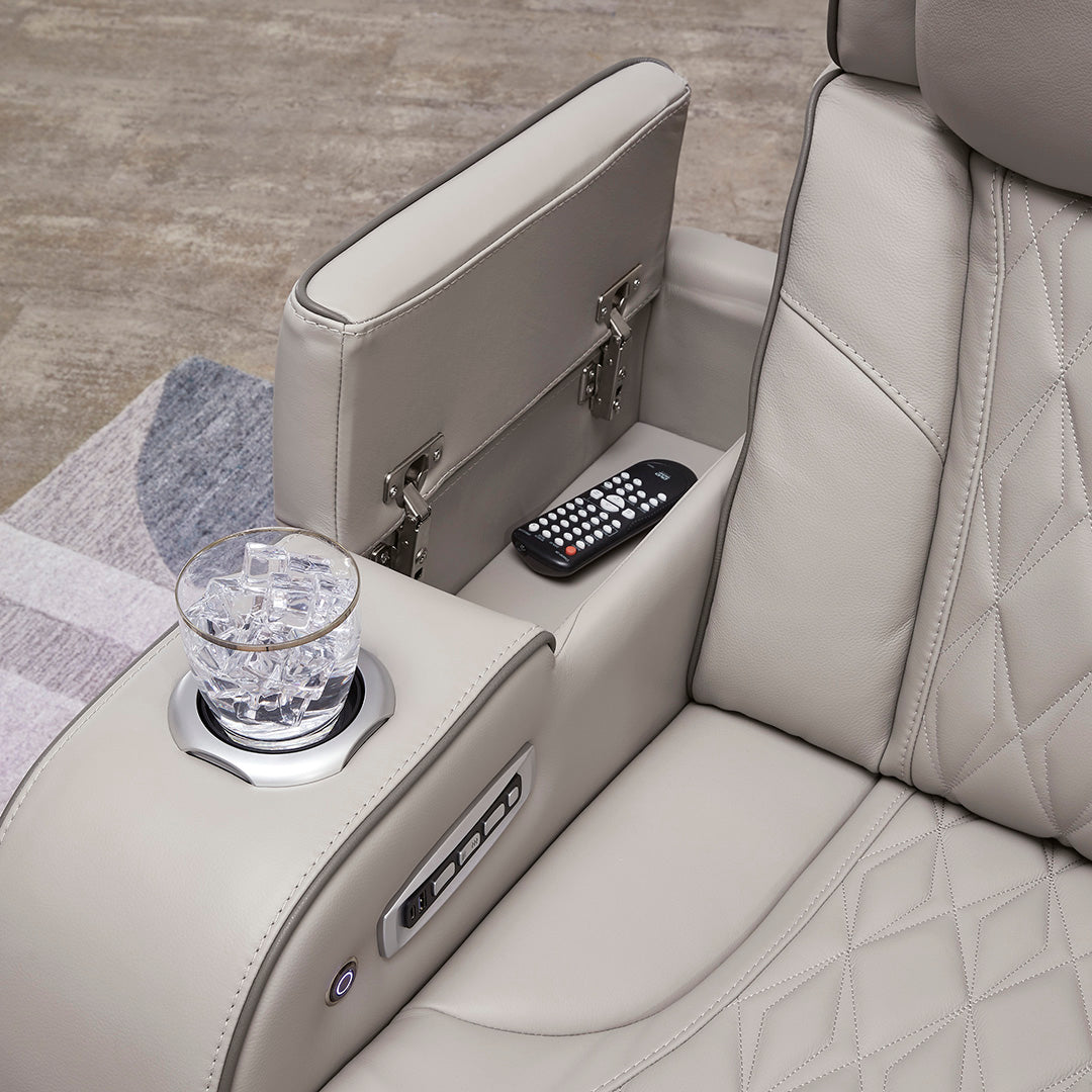 Boyington power reclining sofa by Ashley Furniture with storage arm, cup holder, and power controls