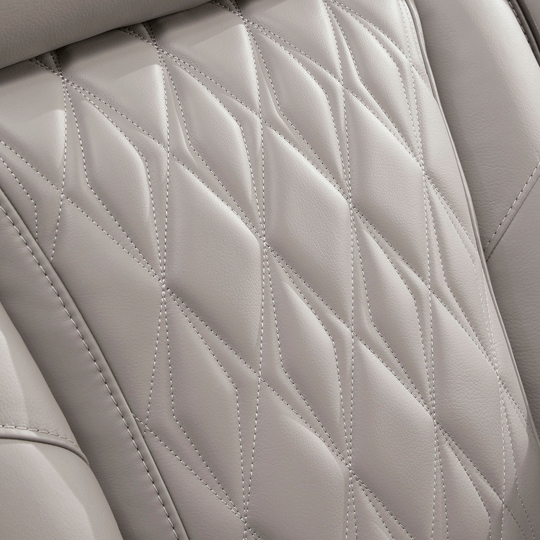 Close-up of quilted upholstery on Boyington power reclining sofa by Ashley Furniture
