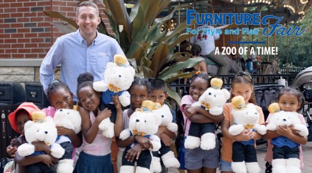 Cincinnati Zoo carousel event with children holding teddy bears