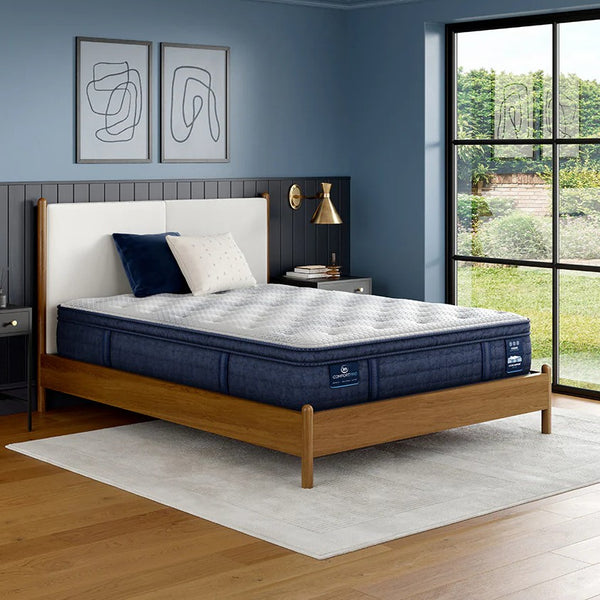 Serta Comfort Pro pillow top mattress with quilted white top in modern bedroom