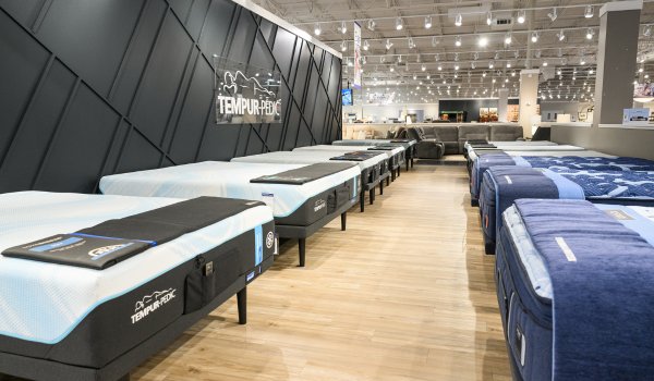 Tempur-Pedic showroom with geometric wall paneling