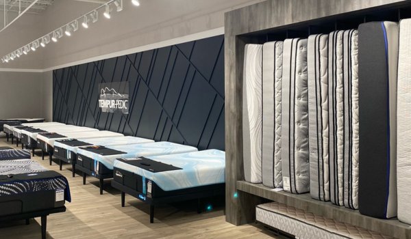 Tempur-Pedic wall display with mattress row