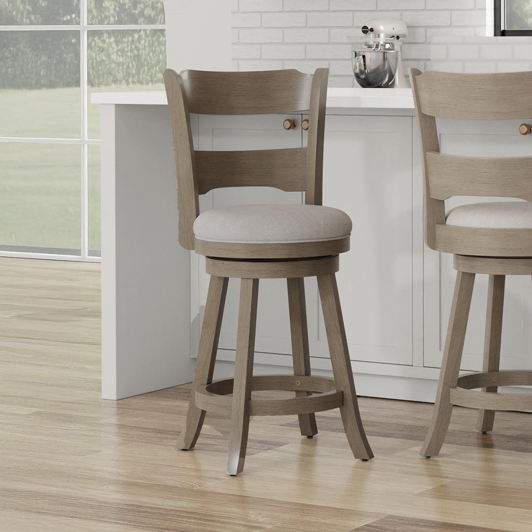 Wooden bar stools with cushioned seats in a kitchen setting