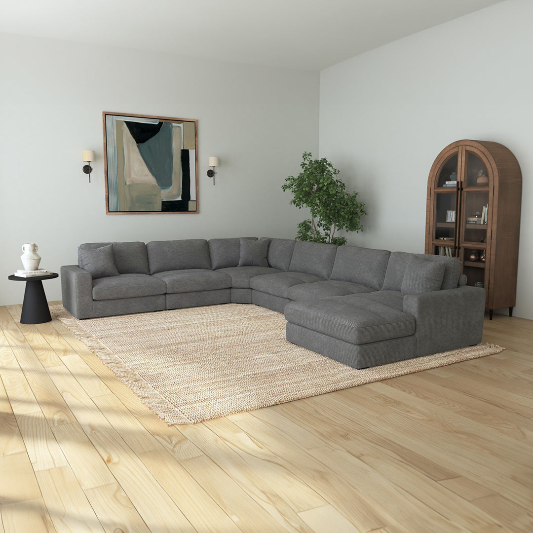 Modern sectional sofa arrangement in a spacious living room setting