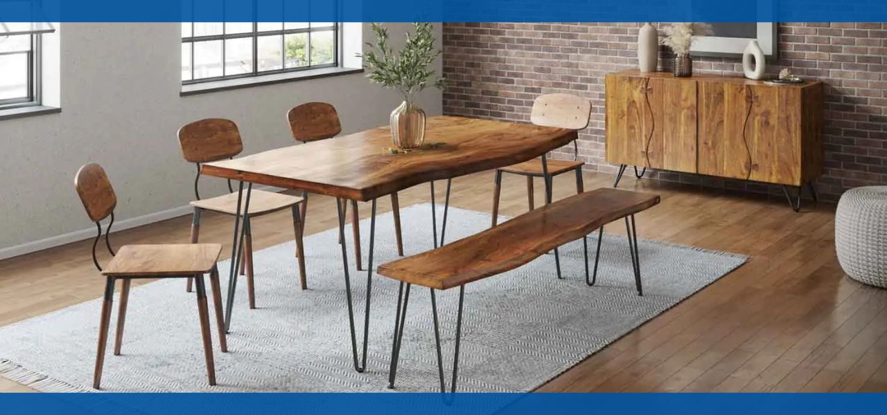 Dining room with wooden table, chairs, and a sideboard on a rug.