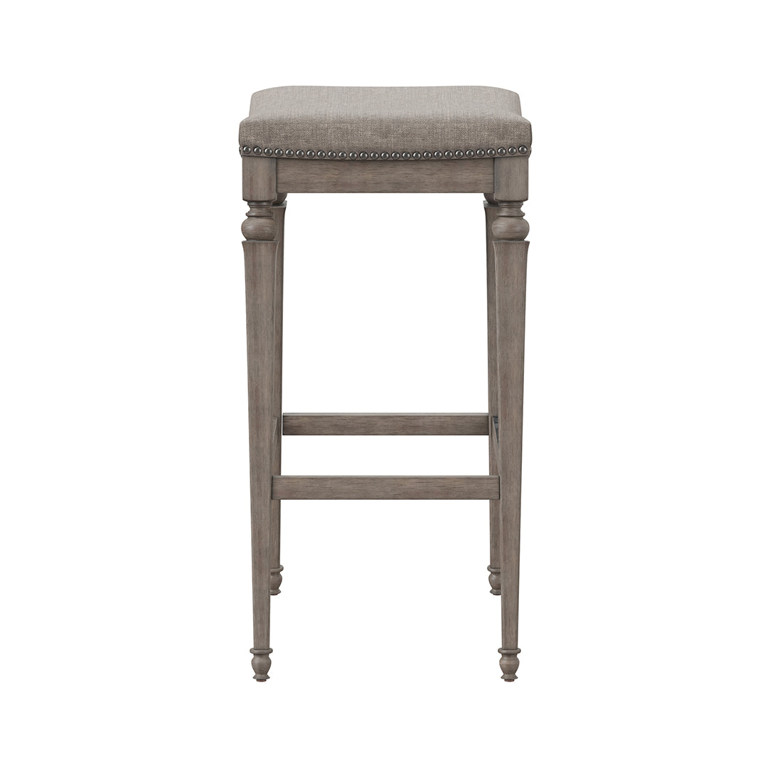 Wooden bar stool with upholstered seat on a white background