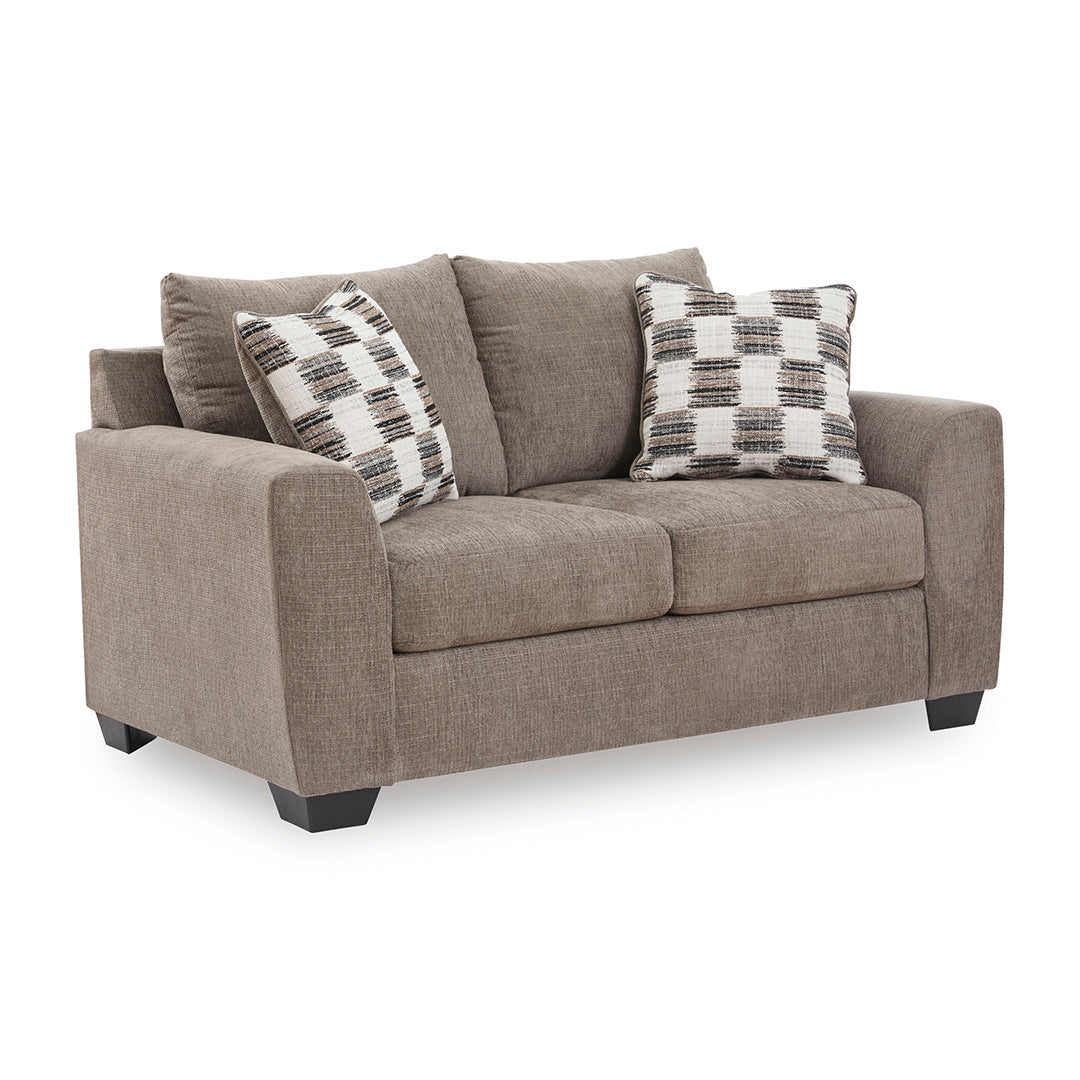 Loreo Loveseat from Signature Design by Ashley in Chenille with Accent Pillows, Reversible Cushions - Angle view