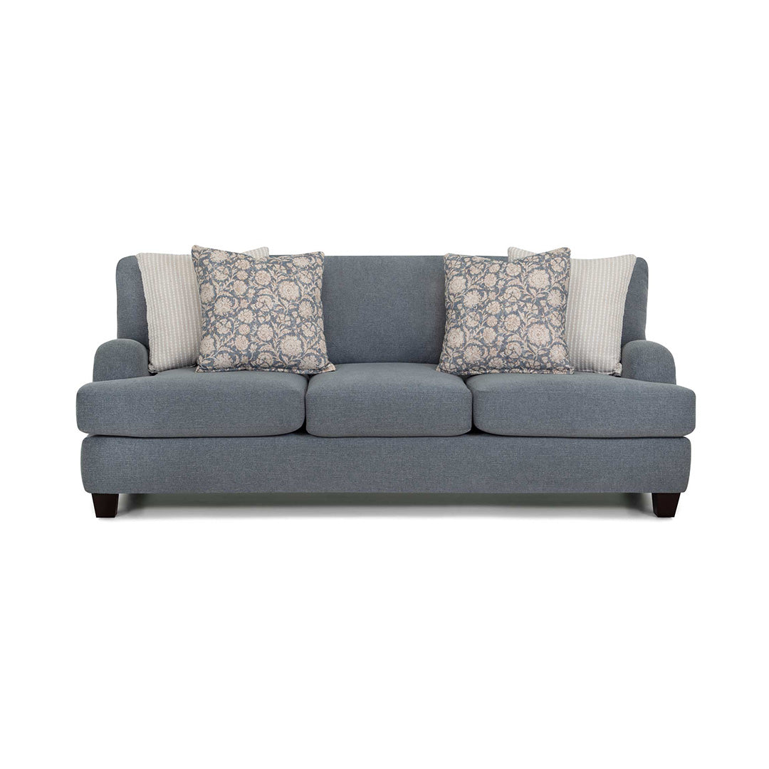 Gray sofa with patterned cushions on a white background