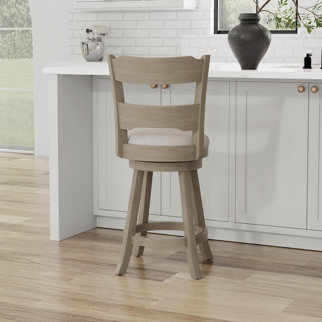 Wooden bar stools with cushioned seats in a kitchen setting