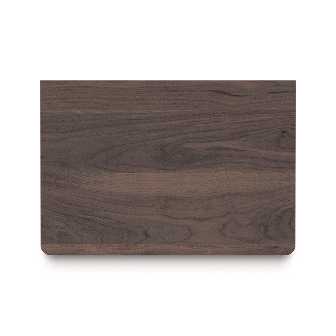 Wooden cutting board with a dark brown finish on a white background
