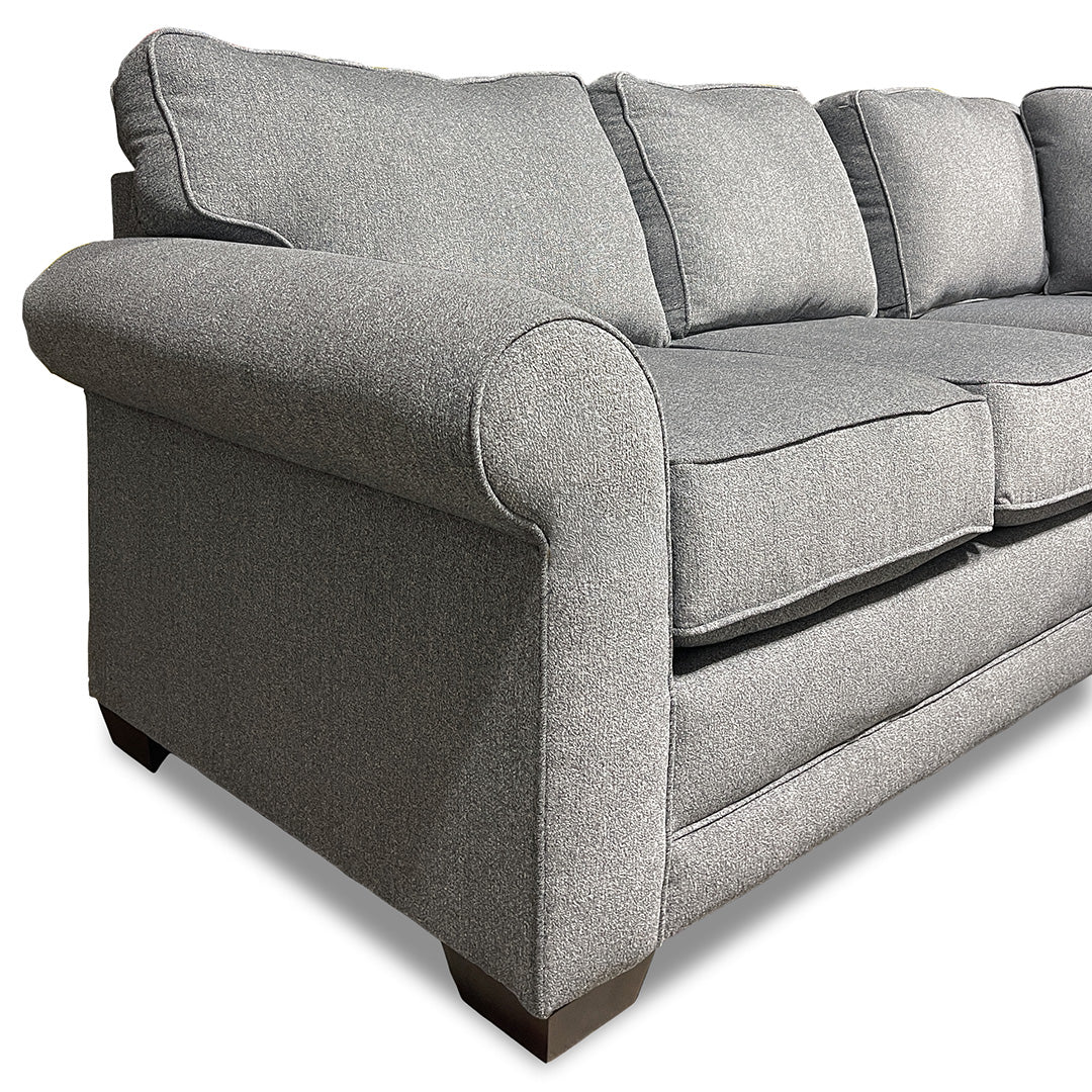 Gray upholstered sofa on a white background