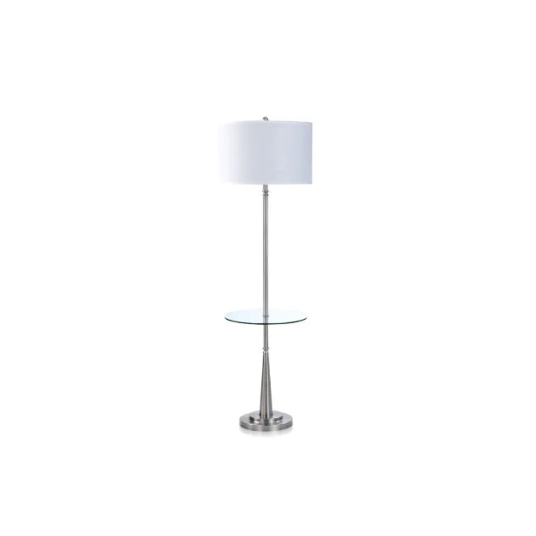 Brushed Steel Floor lamp with a glass table base and white shade on a white background