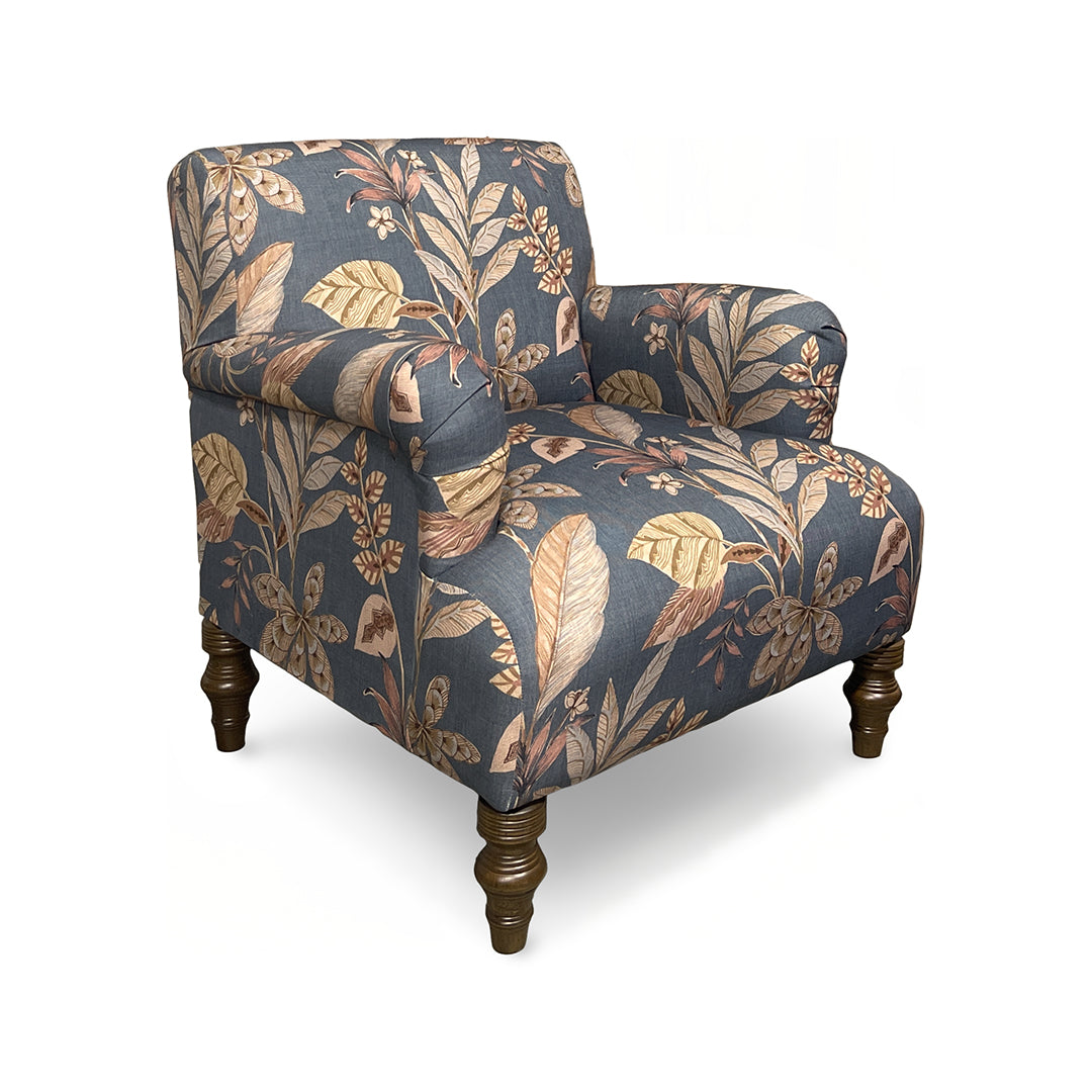 Floral-patterned armchair on a white background