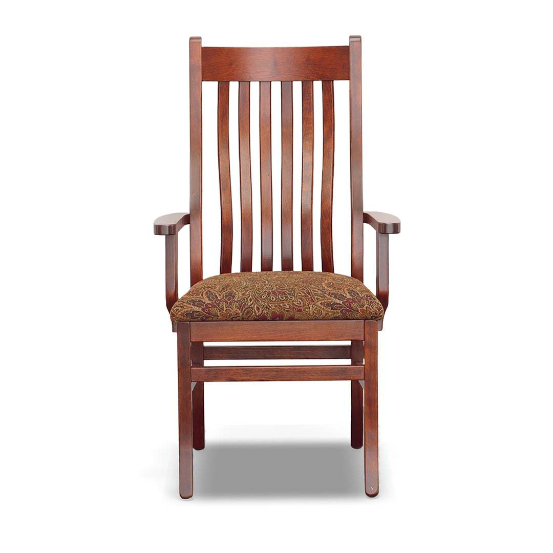 Fairfield Trail Upholstered Arm Chair. Slatted Back with lumbar support. Arm rests frame the upholstered seat. Choose from 9 different fabric options if you want to swap out upholstery. Made from solid hardwood by Amish craftsman in Ohio. 