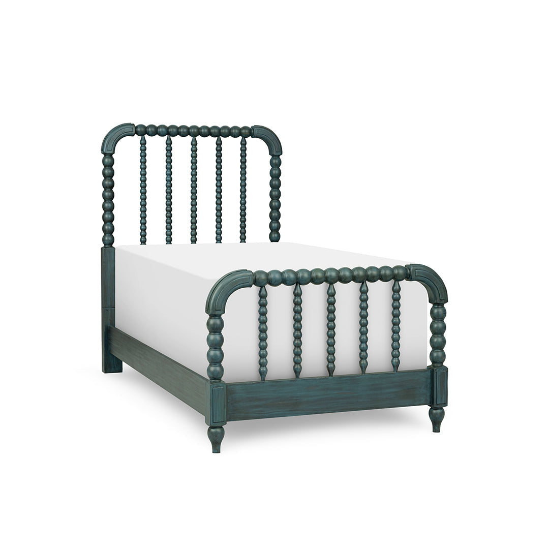 A single bed frame with a distressed teal green finish and turned spindle-style posts, shown with a white mattress on a clean white background.