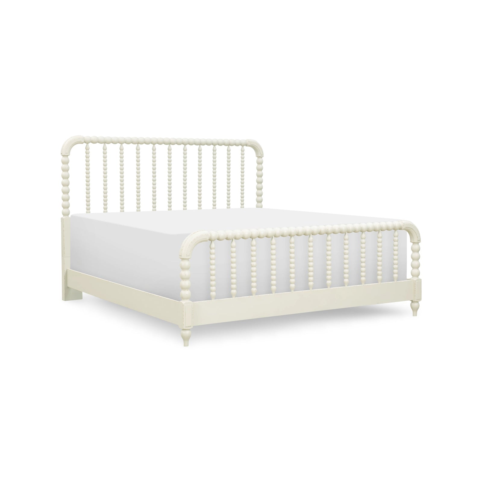 A white spindle-top bed frame with a mattress, shown from a three-quarter angle on a solid white background.