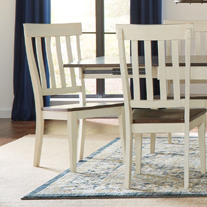 Mariposa Dining Chair. Slat Backs finished in white with cocoa bean colored seats.