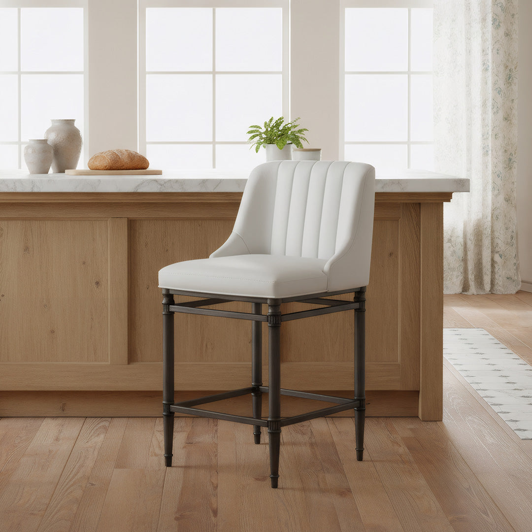 White cushioned bar stool with black metal frame 