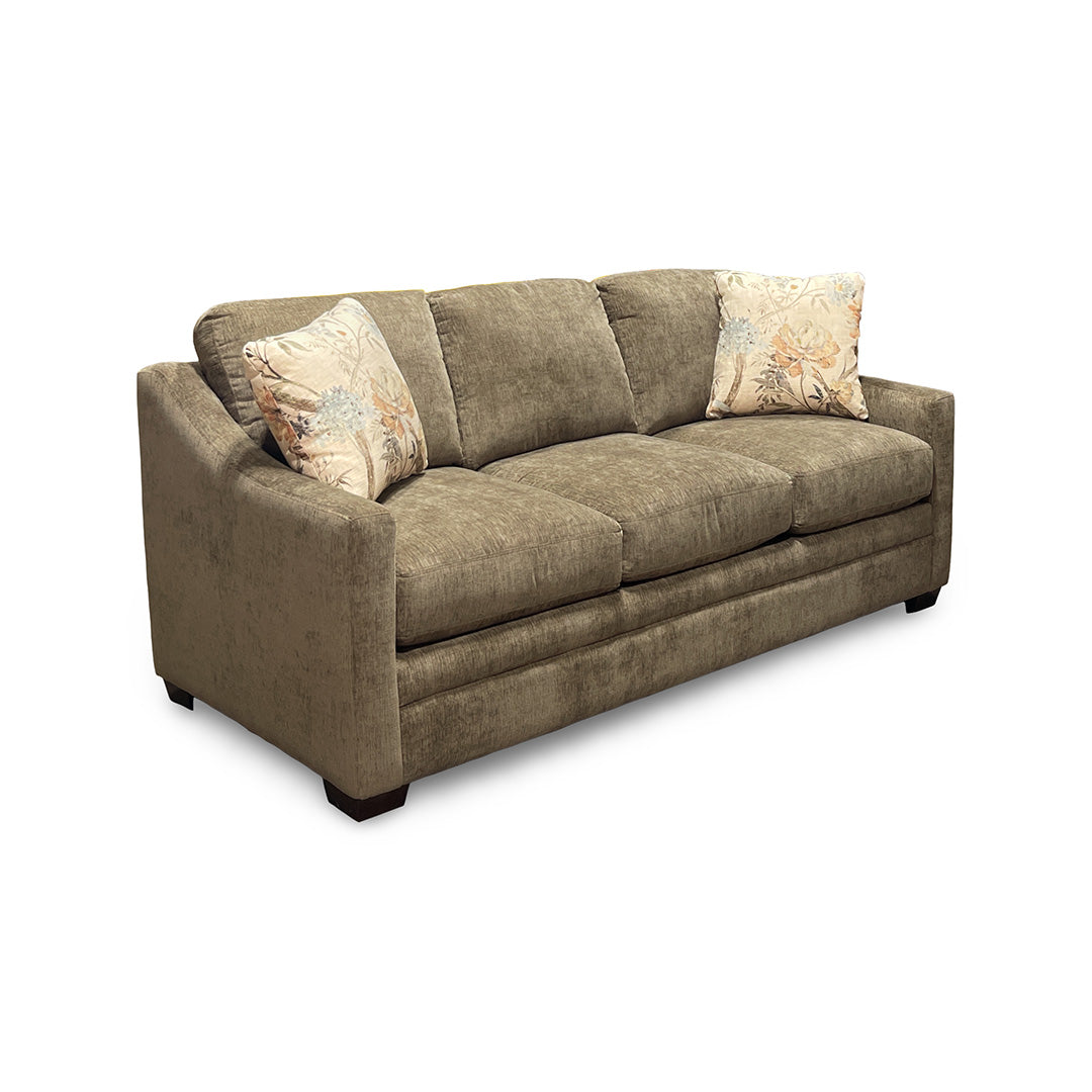 Brown sofa with decorative pillows