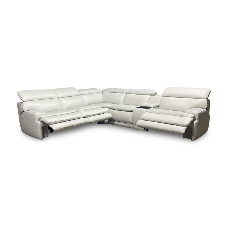 Moto Motion white power reclining sectional sofa with console and cupholders in a studio setting