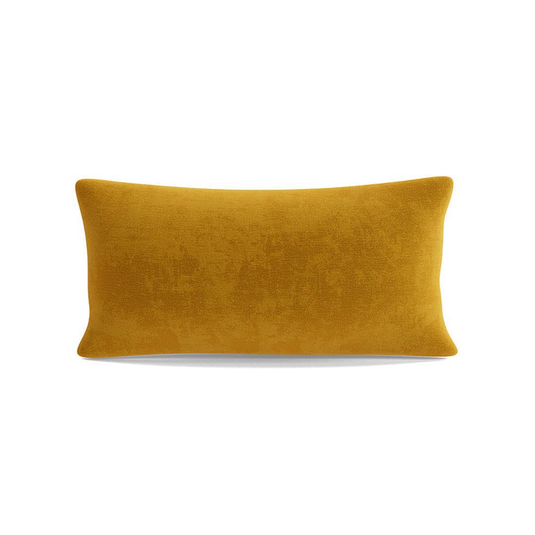 Mustard yellow pillow on a white background