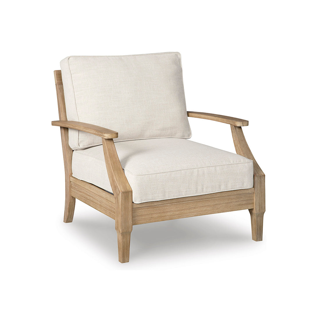 Wooden armchair with white cushions on a white background