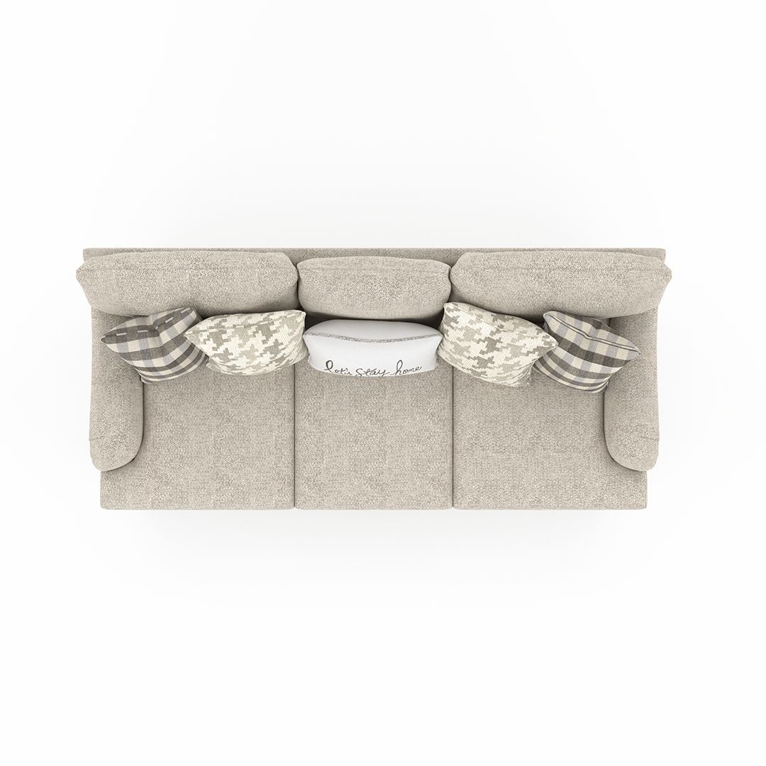 Fabric sofa overhead with decorative pillows on a white background