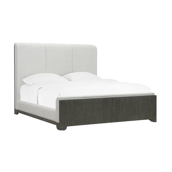 Queen bed with gray upholstered headboard and dark wooden frame.