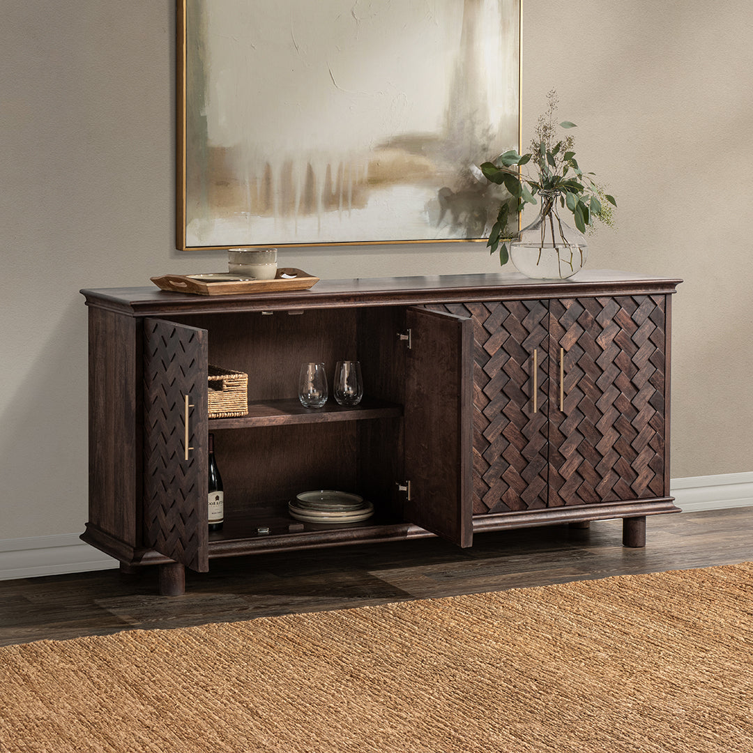 Dark wood sideboard with decorative herringbone pattern and large hardware.