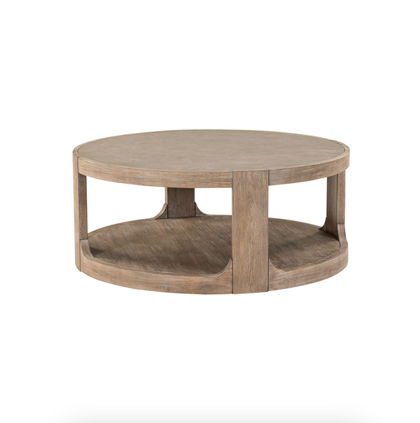 South Bend round cocktail table in medium oak finish with Cathedral White Oak veneers and casters, angled view, from Liberty Furniture
