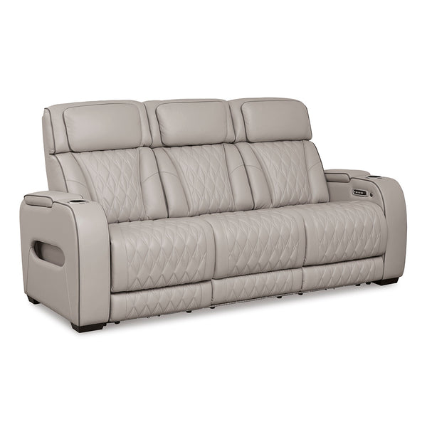 Boyington power reclining sofa by Ashley Furniture with quilted upholstery and padded arms