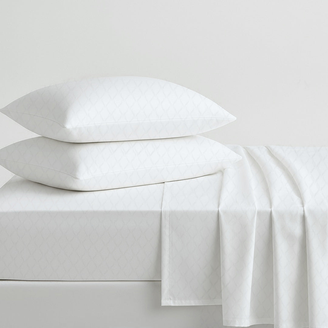 Cooling cotton sheets in white, folded product view, from Lusome