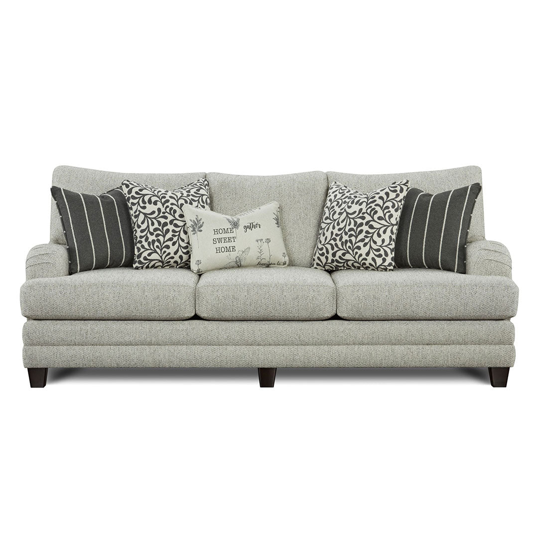 Silhouette of the Basic Berber Sofa showcasing its elegant English arms, T-cushions, and tapered legs in a simple, clean design.